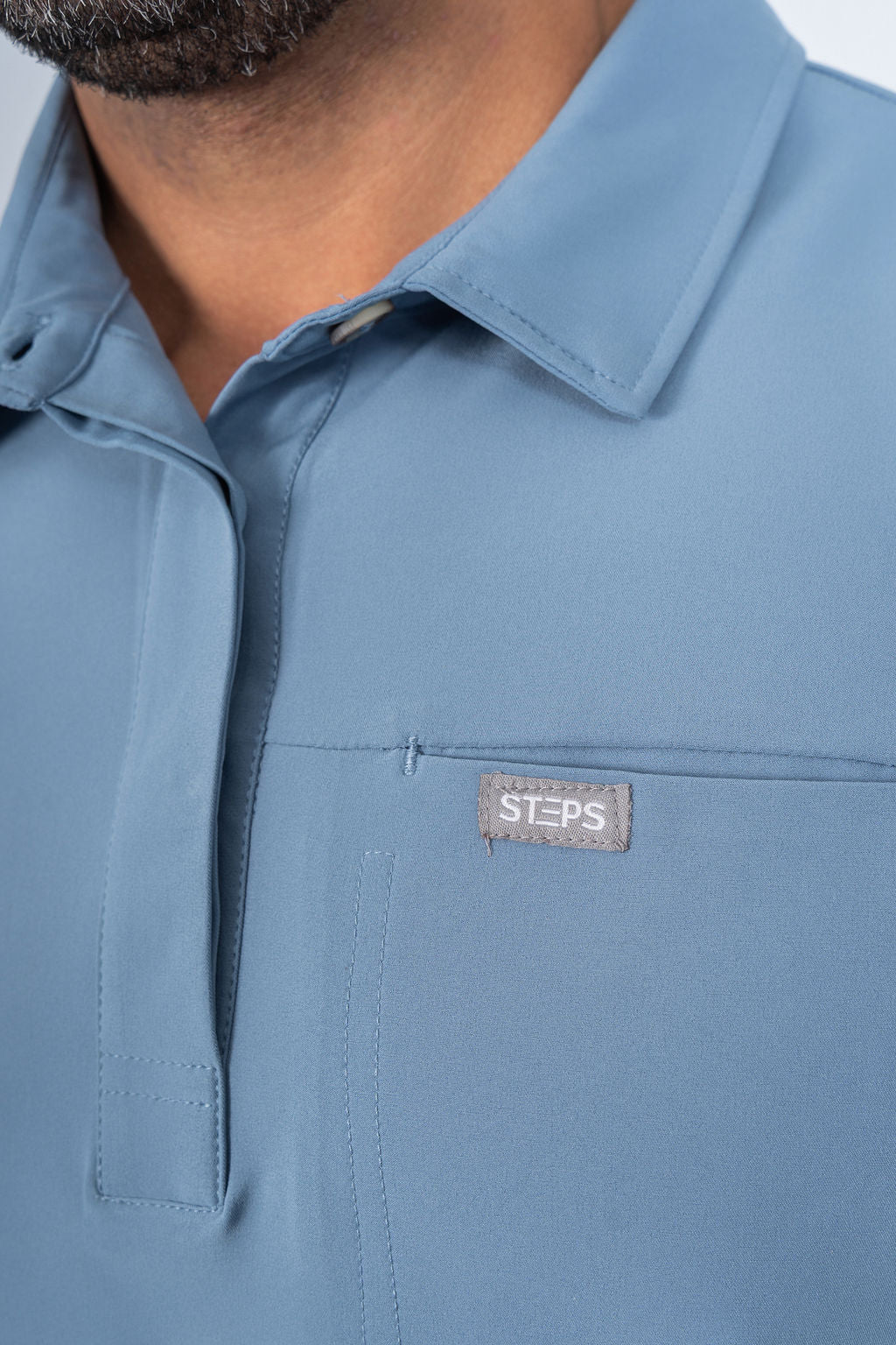 Steel Blue Matteo Three-Pocket Scrub Top and Neo Jogger Set